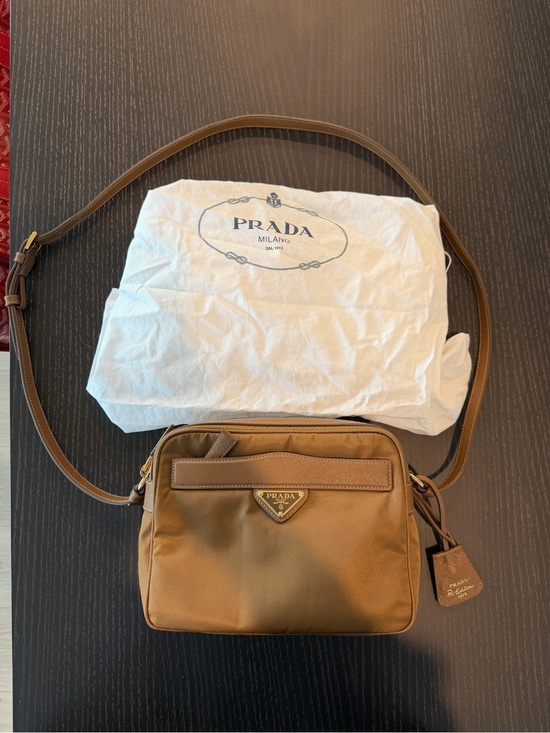 Prada Handbags - Prada cognac re-Nylon camera crossbody Bag with Leather Trim; worn 10 times max